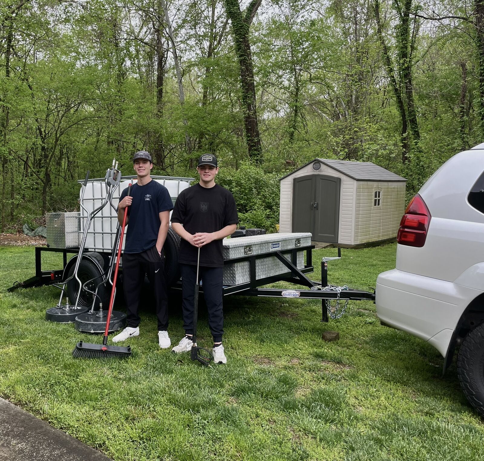 Ben and Carter, TruShine co-founders, with their pressure washing rig